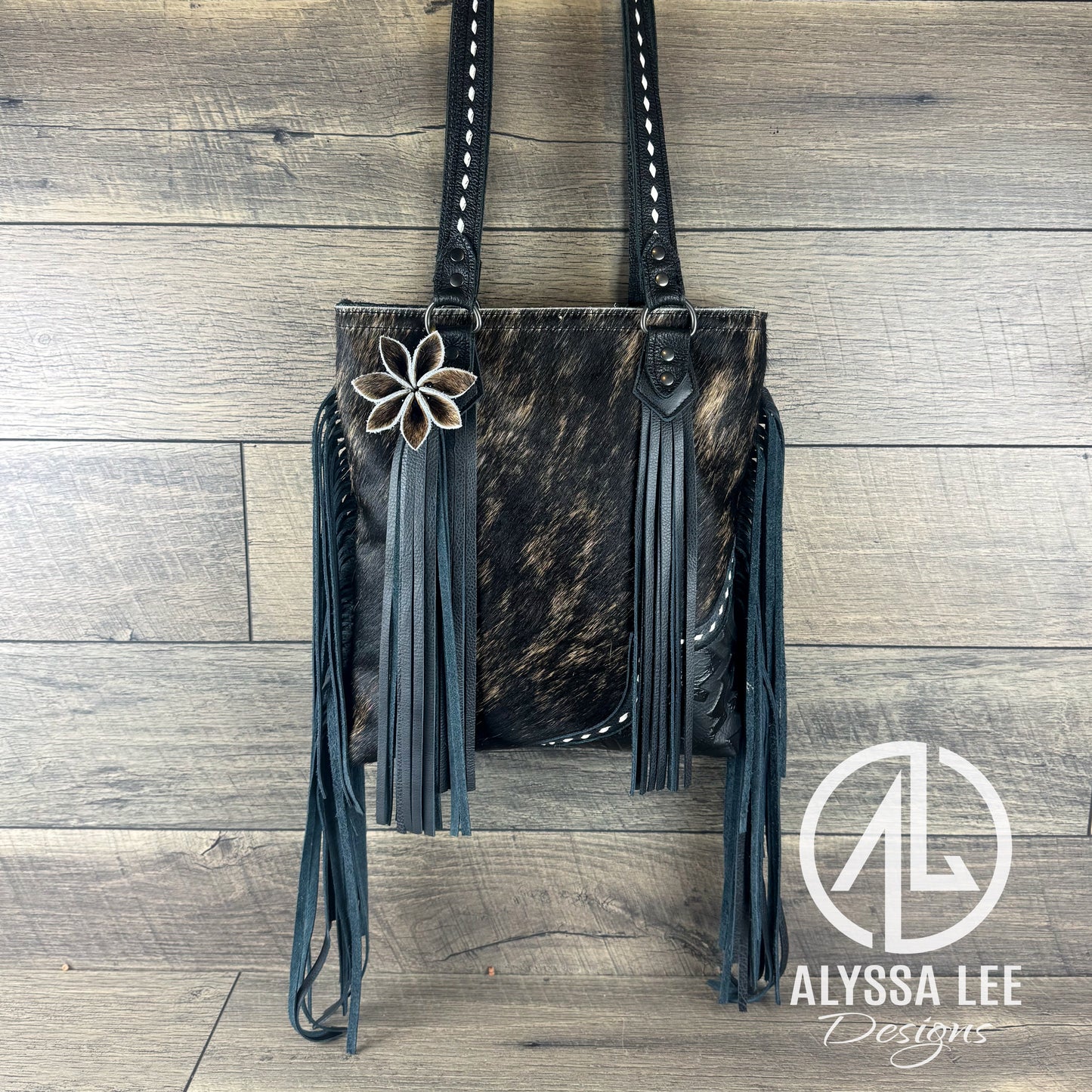 “Harlow” - Black & Buckskin Cowhide w/Buckstitching